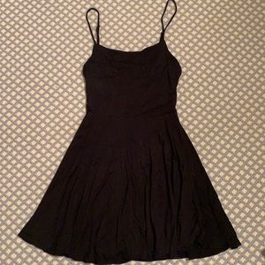 Simple black dress with cutout in the back from Kimchi Blue